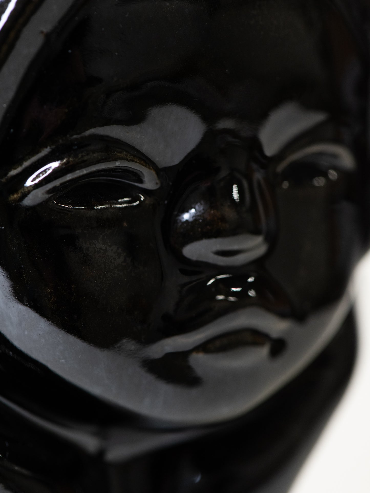 Glossy Black Ceramic Head Sculpture by TEKT